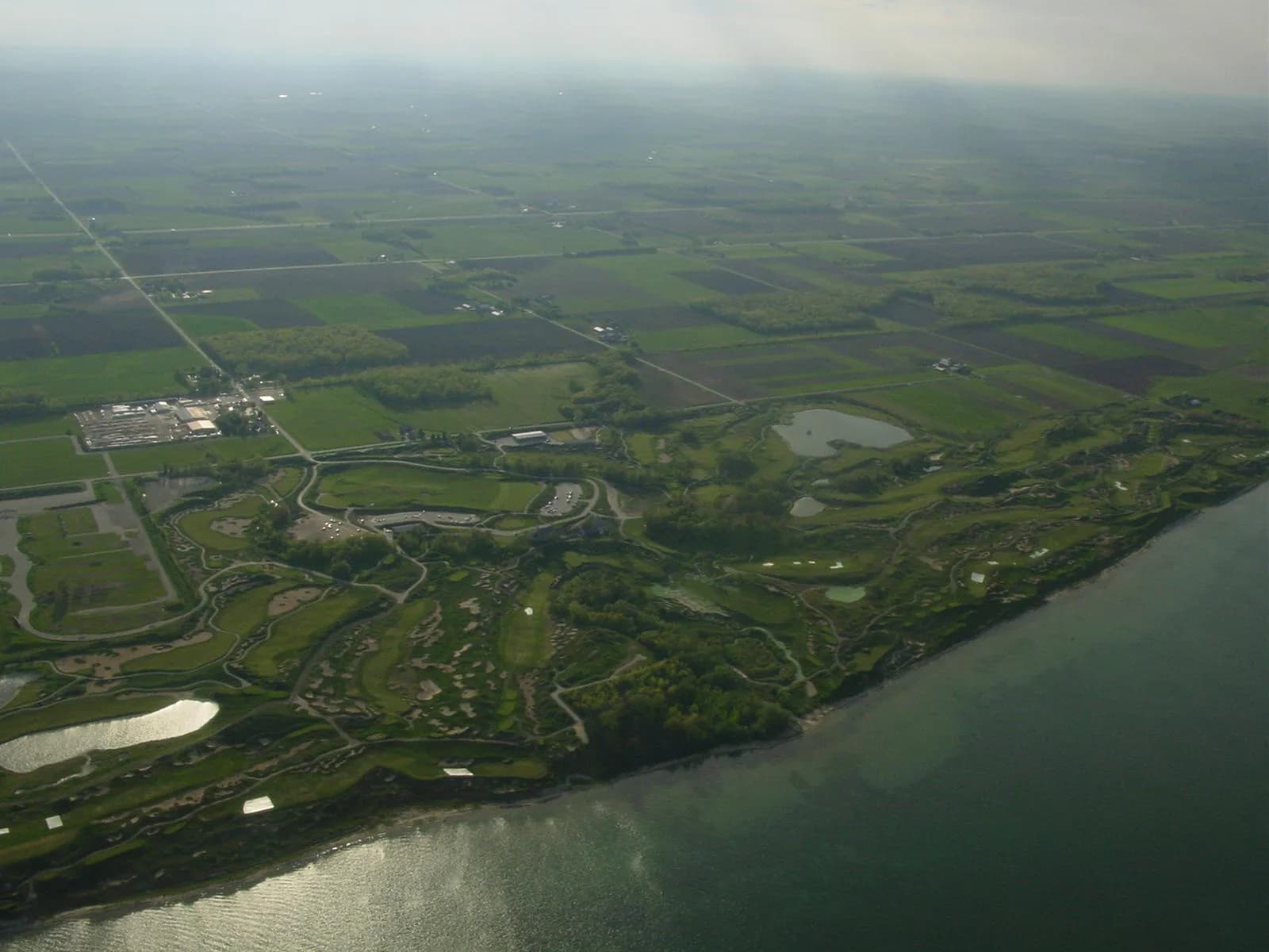 Aerial overview of Whistling Straits golf course on Lake Michigan, Kohler, Wisconsin (photographed 1 June 2005).